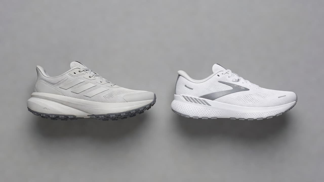 Two distinct athletic running shoes are positioned side by side on a neutral gray surface. The top-down view highlights the differing tread patterns, mesh fabric textures, and overall structural design profiles.