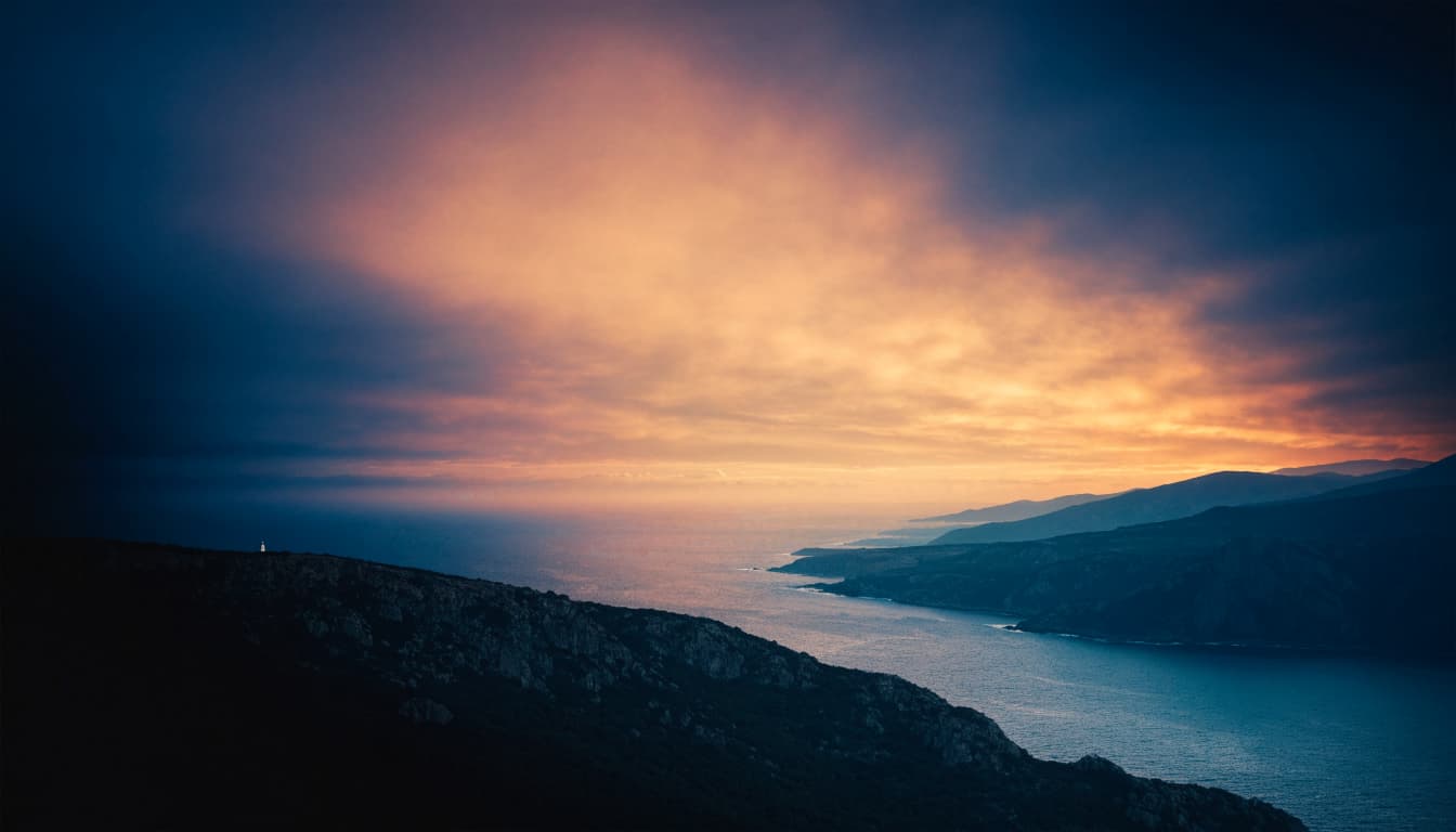 A small lighthouse overlooks a dark coast and layered ocean beneath a glowing coral sunset.