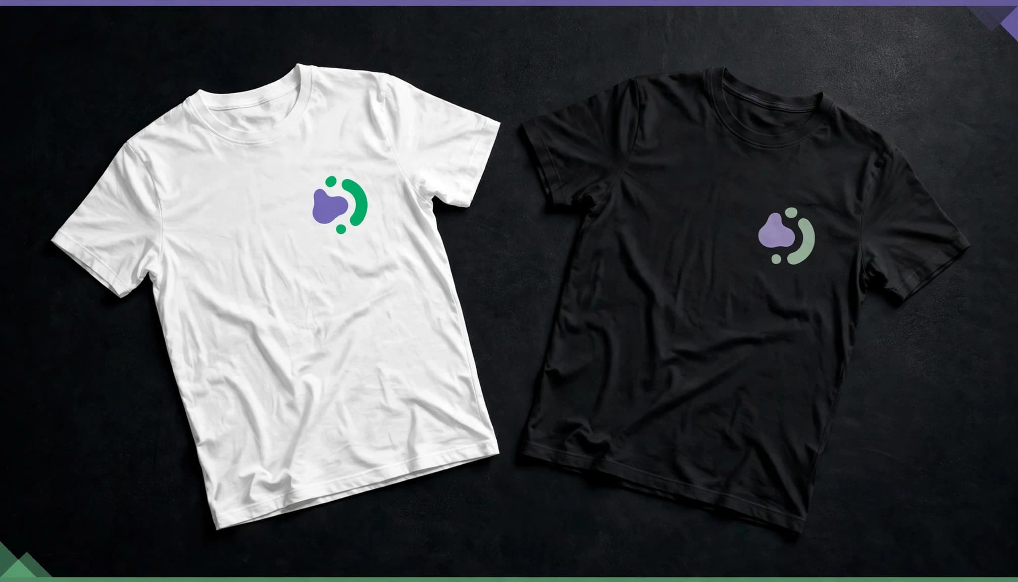 White and dark blank T-shirts with abstract chest graphics on a black background.